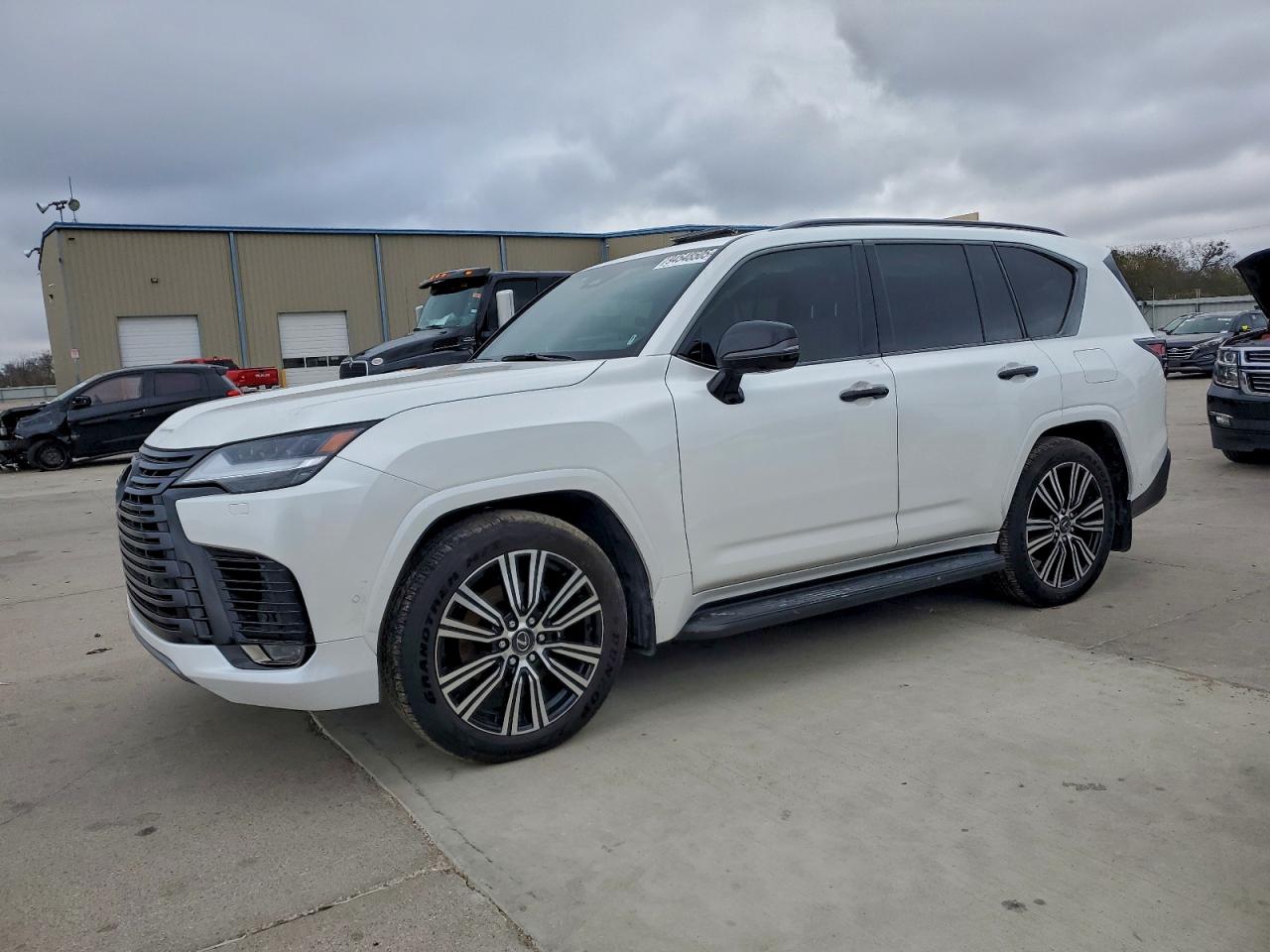 2025 Lexus LX 700H OVERTRAIL, VIN JTJGD7CX0S4002909 — Side