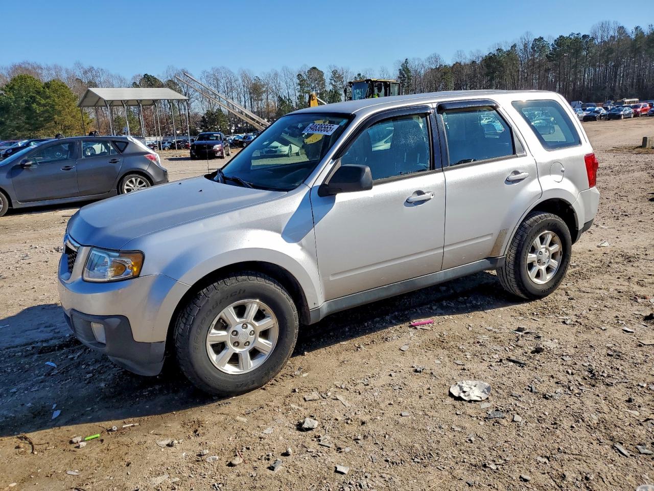 2011 Mazda Tribute Sport, VIN 4F2CY0C77BKM05360 — Мелкие вмятины и царапины