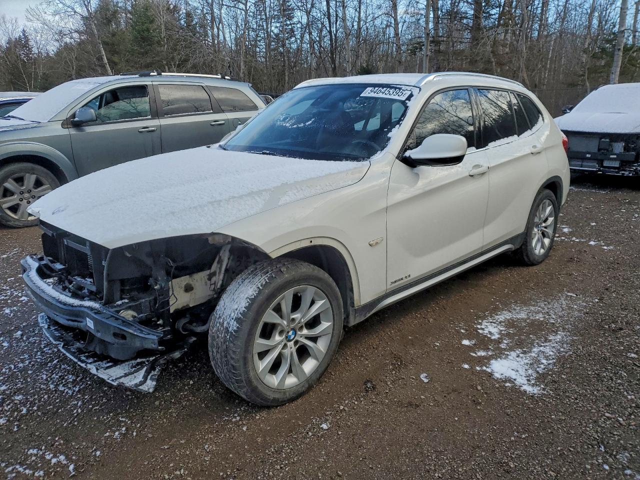 2012 BMW X1 28i, VIN WBAVL1C50CVR78321 — Front end