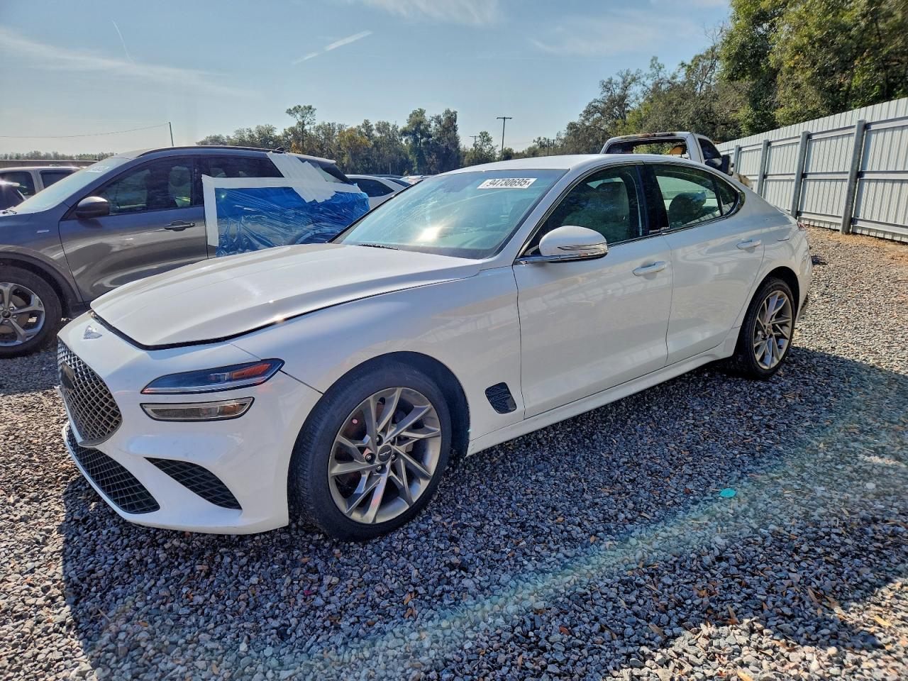 2022 Genesis G70 2.0T, VIN KMTG34TA6NU093352 — Front end