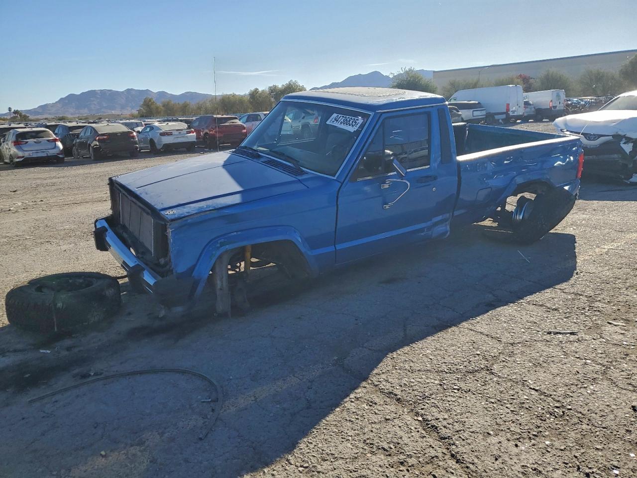 1987 Jeep Comanche, VIN 1JTMW64P5HT156540 — Бок