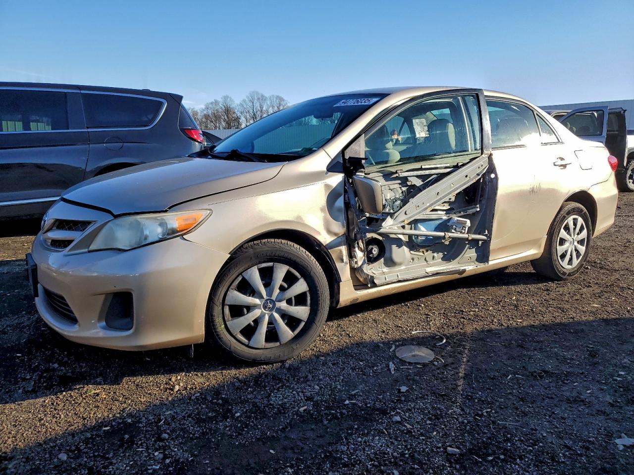 2011 Toyota Corolla LE, VIN JTDBU4EE8B9131779 — Side
