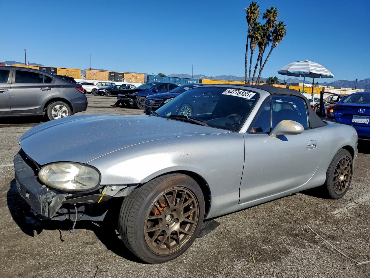 1999 Mazda MX-5 Miata, VIN JM1NB3530X0105197 — Front end