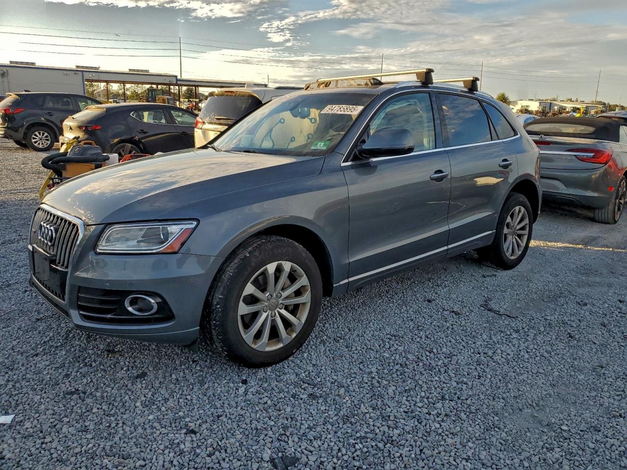 2016 Audi Q5 Premium Plus, VIN WA1L2AFP9GA149071 — Side
