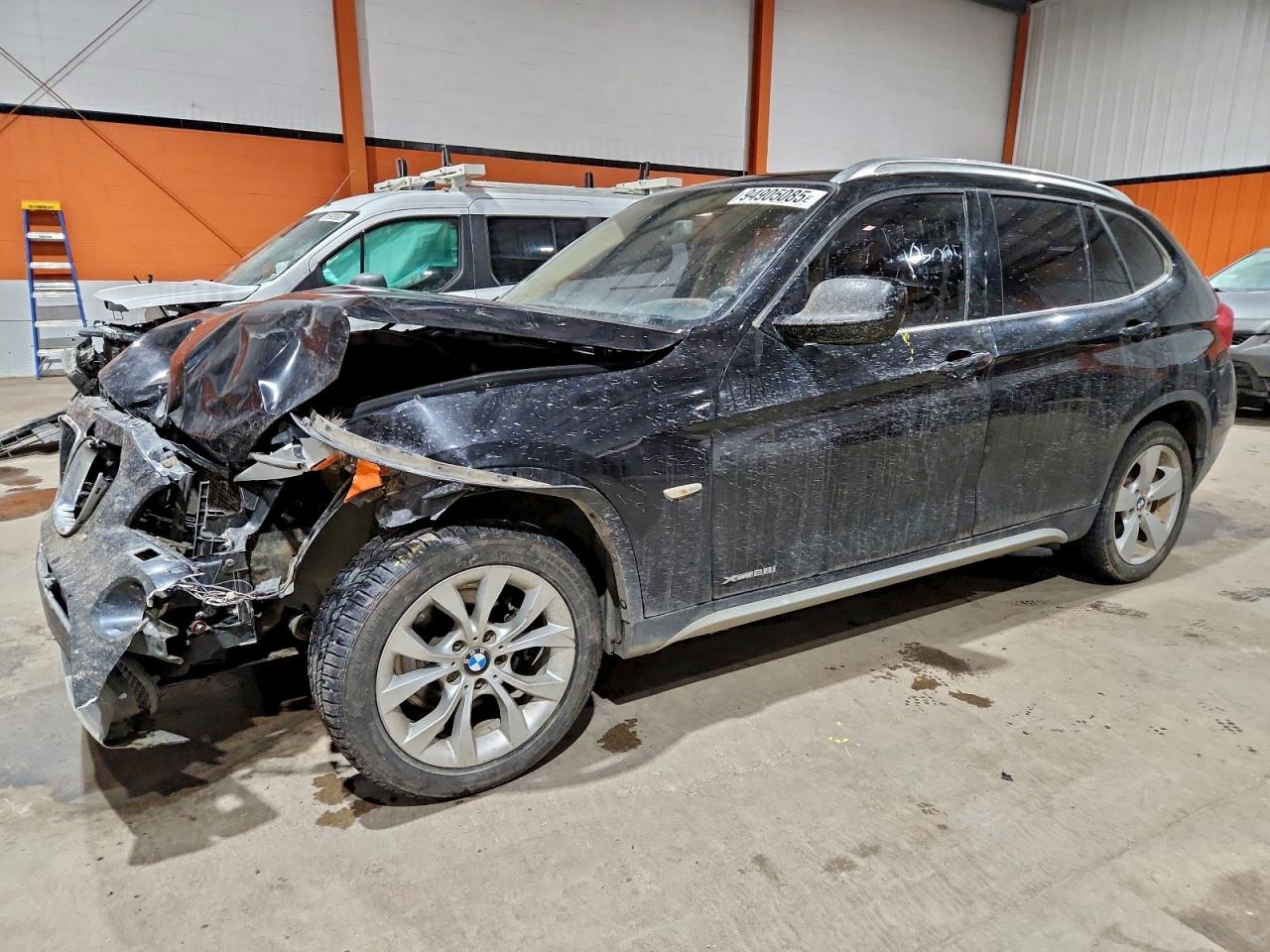2012 BMW X1 28i, VIN WBAVL1C5XCVR79220 — Front end