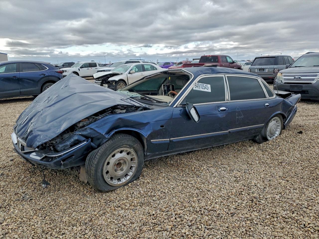 1998 Jaguar XJ Vanden Plas, VIN SAJKX6243WC831475 — Rollover