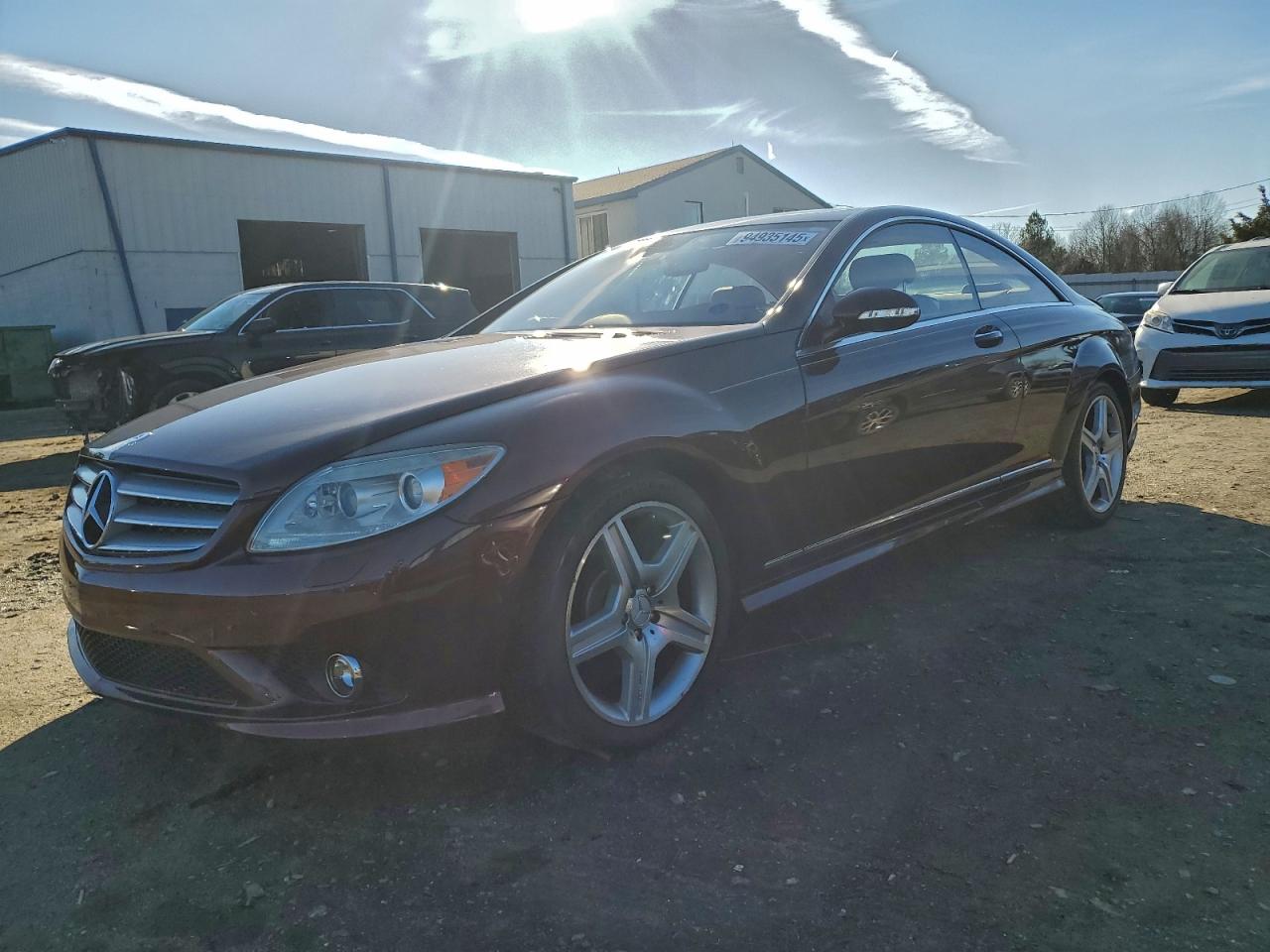 2009 Mercedes-Benz CL 550, VIN WDDEJ86X09A022602 — Side