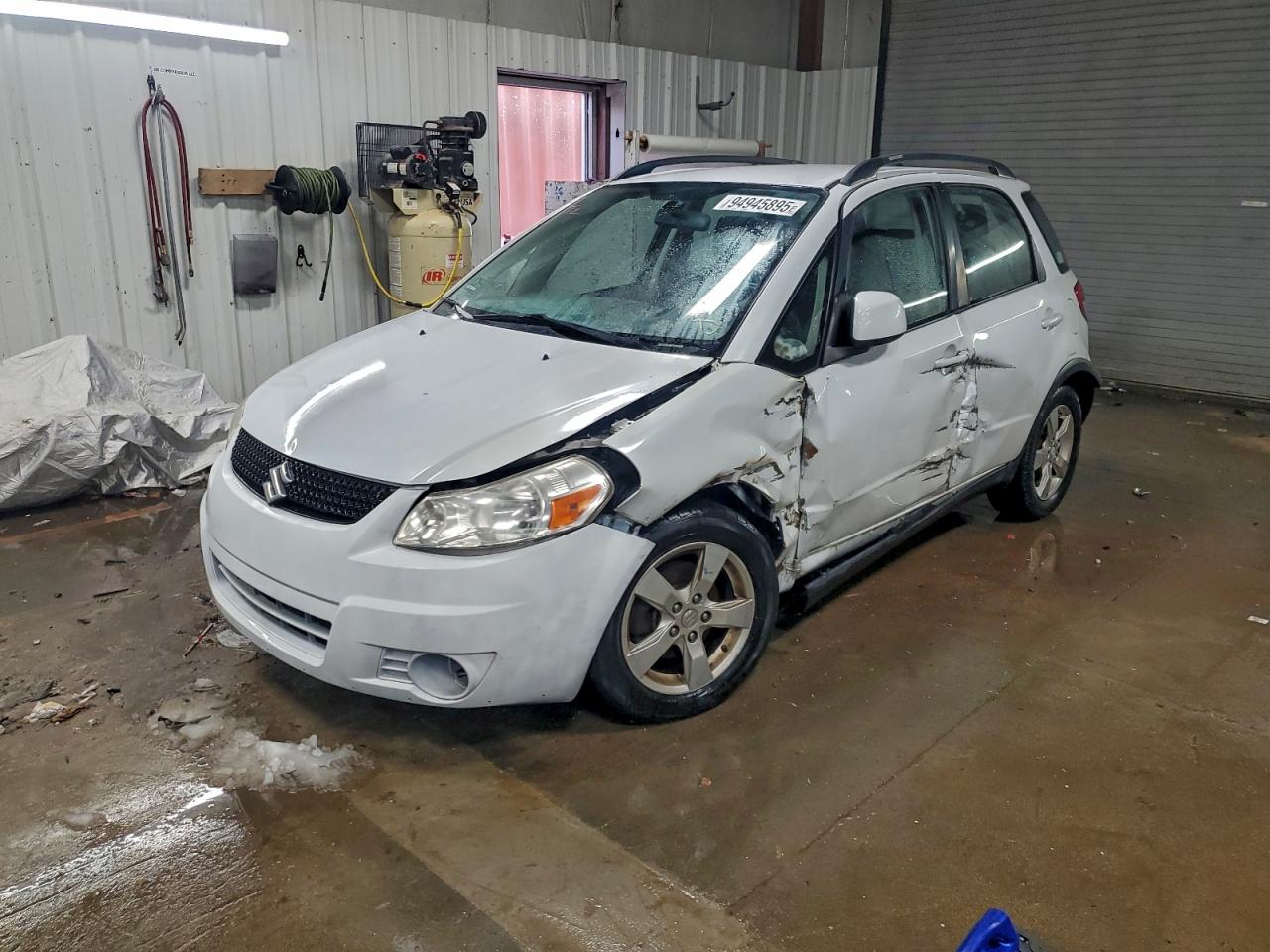 2012 Suzuki SX4 Crossover, VIN JS2YB5A36C6308252 — Side