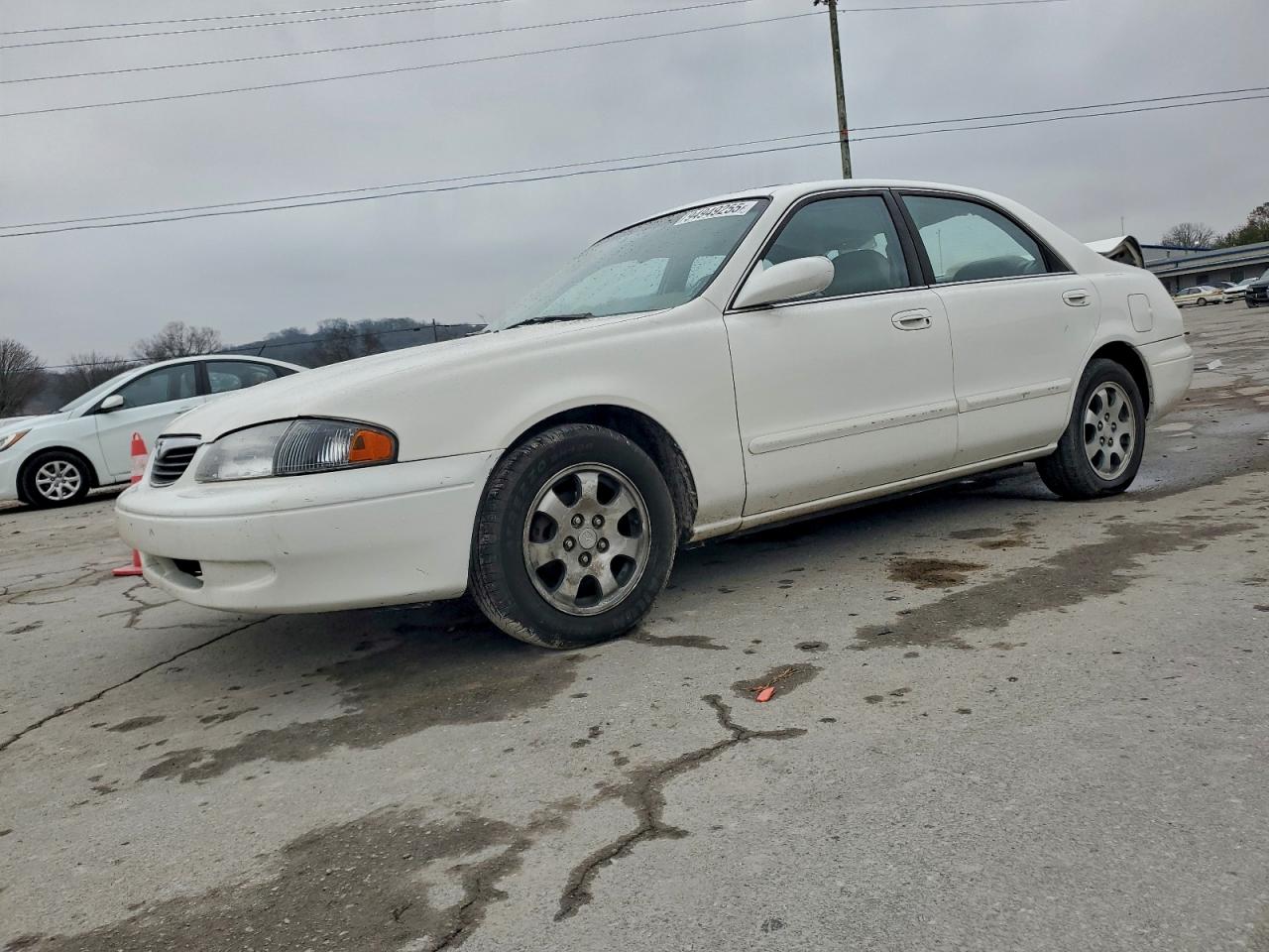 1999 Mazda 626 ES, VIN 1YVGF22C6X5822258 — Rear end