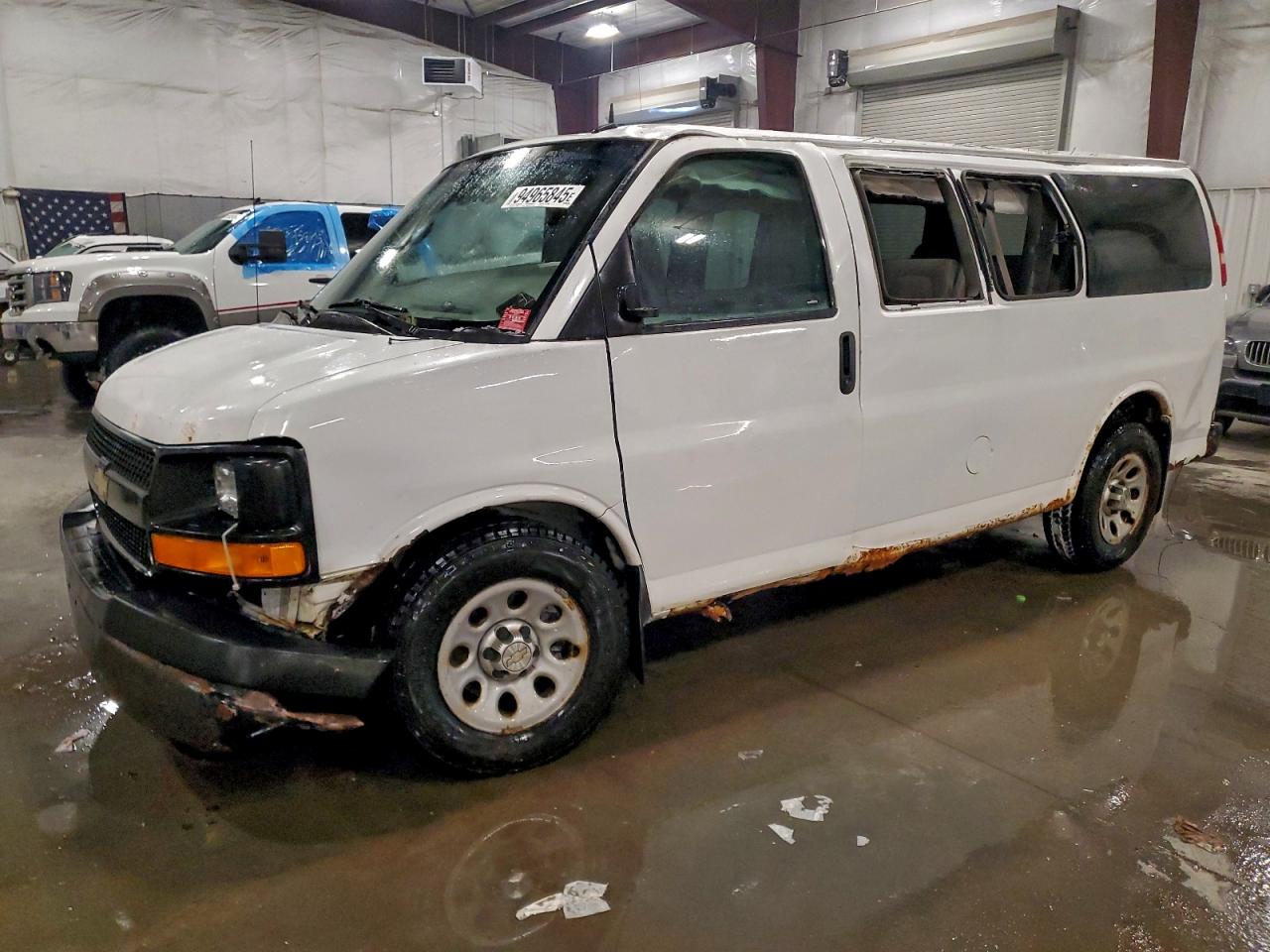 2012 Chevrolet Express G1500, VIN 1GNSHBF4XC1125052 — Rollover