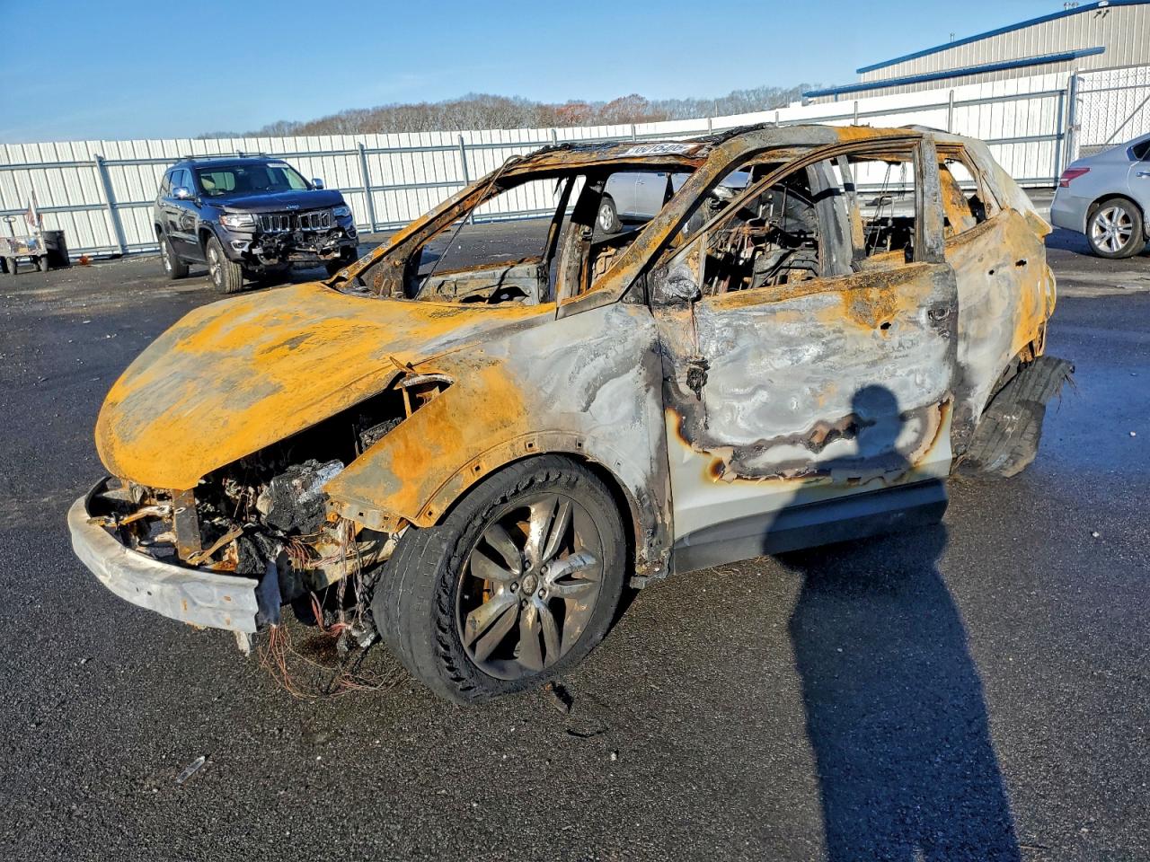 2016 Hyundai Santa Fe, VIN 5XYZWDLA2GG319292 — Burn