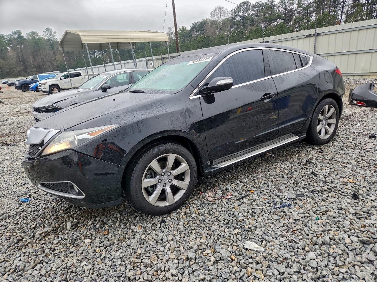 2011 Acura ZDX Technology, VIN 2HNYB1H46BH500733 — Rear end