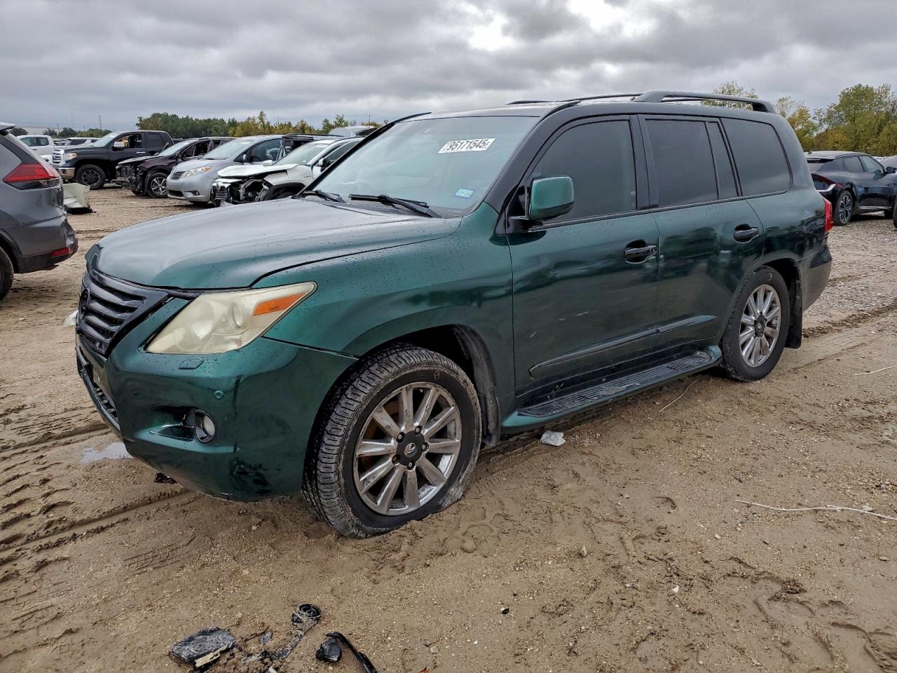 2009 Lexus LX 570, VIN JTJHY00W694022412 — Перед