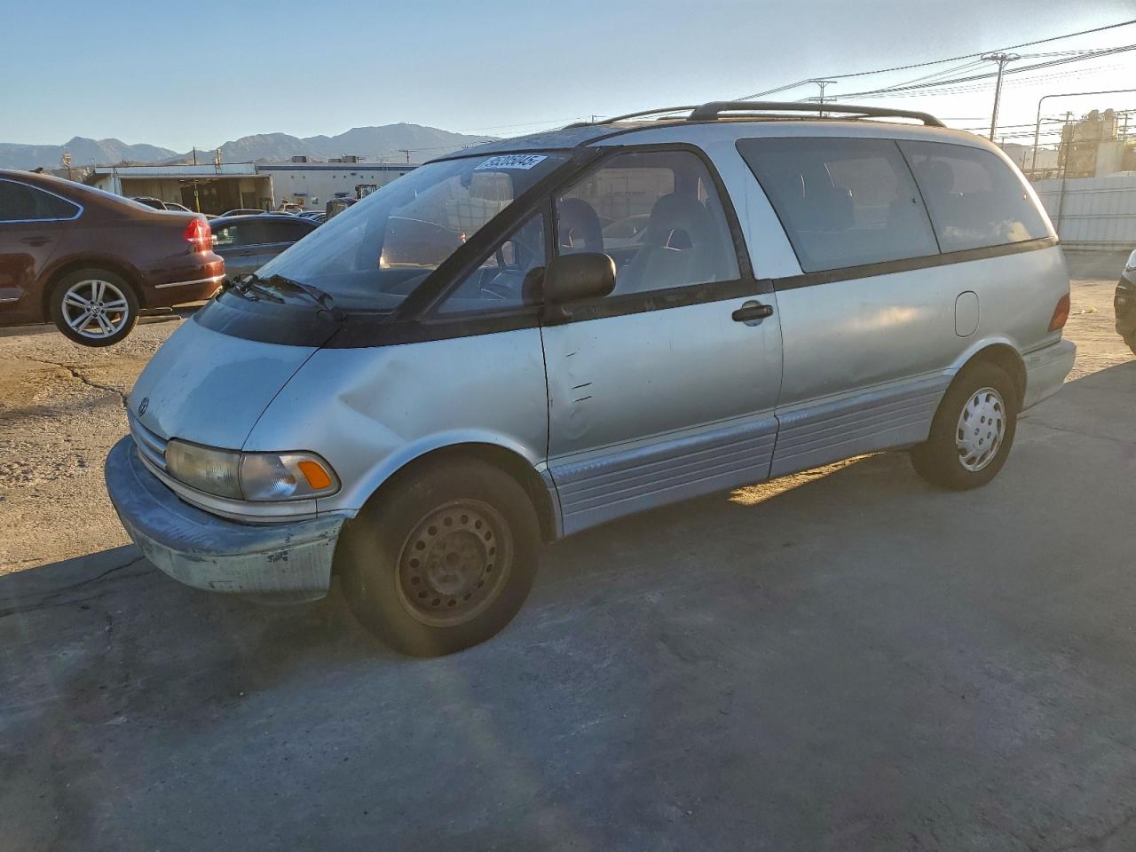 1993 Toyota Previa LE, VIN JT3AC12R1P1079961 — Side