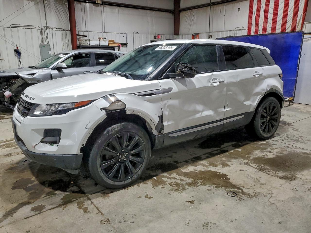 2014 Land Rover Range Rover Evoque Prestige, VIN SALVV2BGXEH876766 — Side