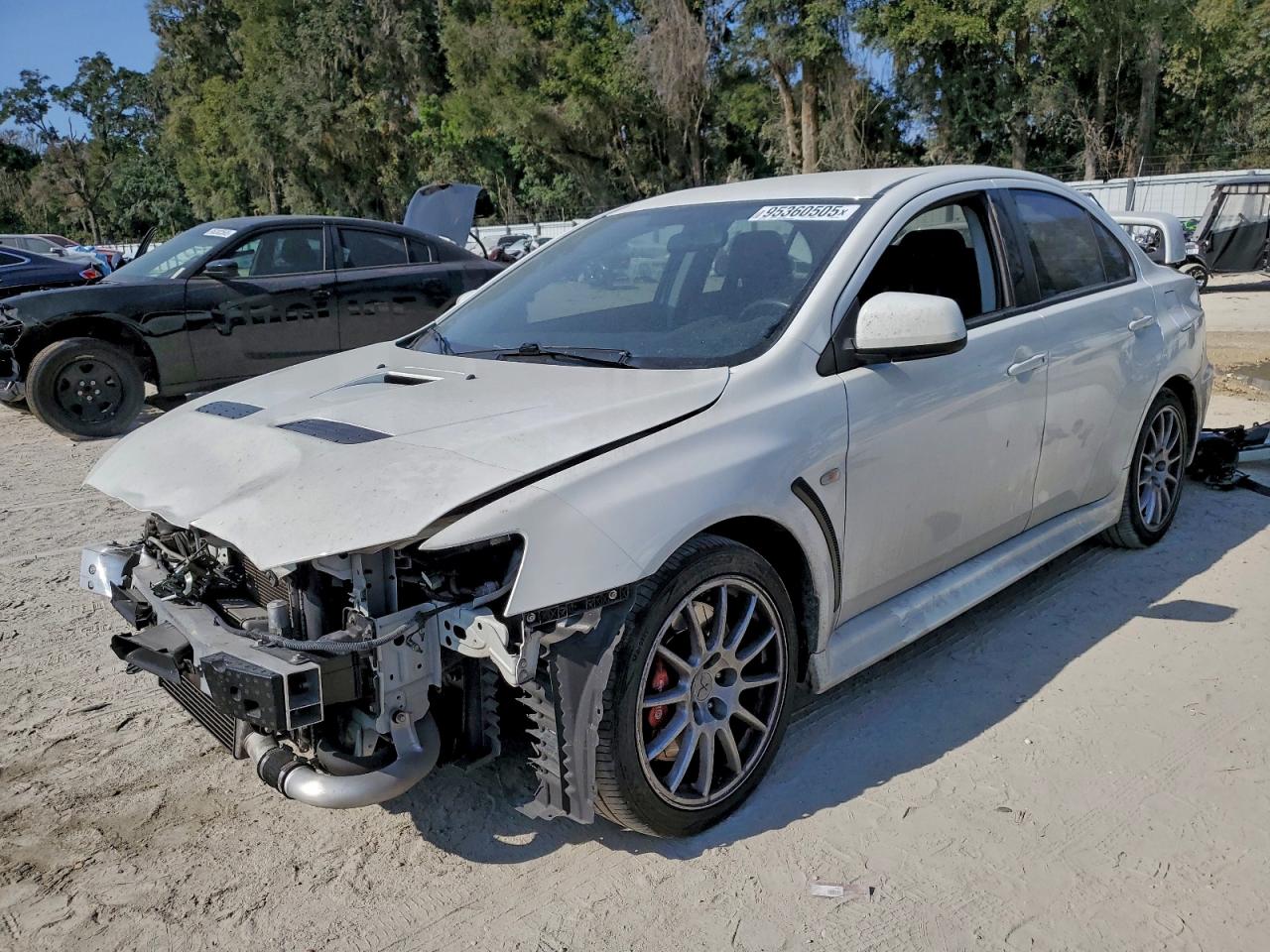 2014 Mitsubishi Lancer Evolution GSR, VIN JA32W8FVXEU011076 — Front end