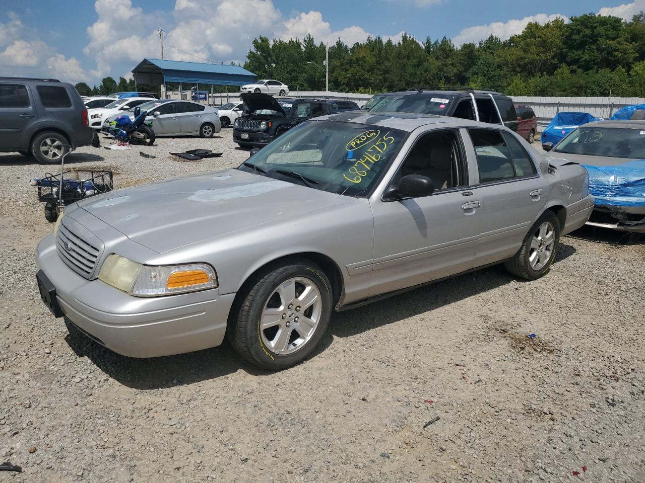 2007 Ford Crown Victoria LX, VIN 2FDHP74W07X116857 — Frame damage