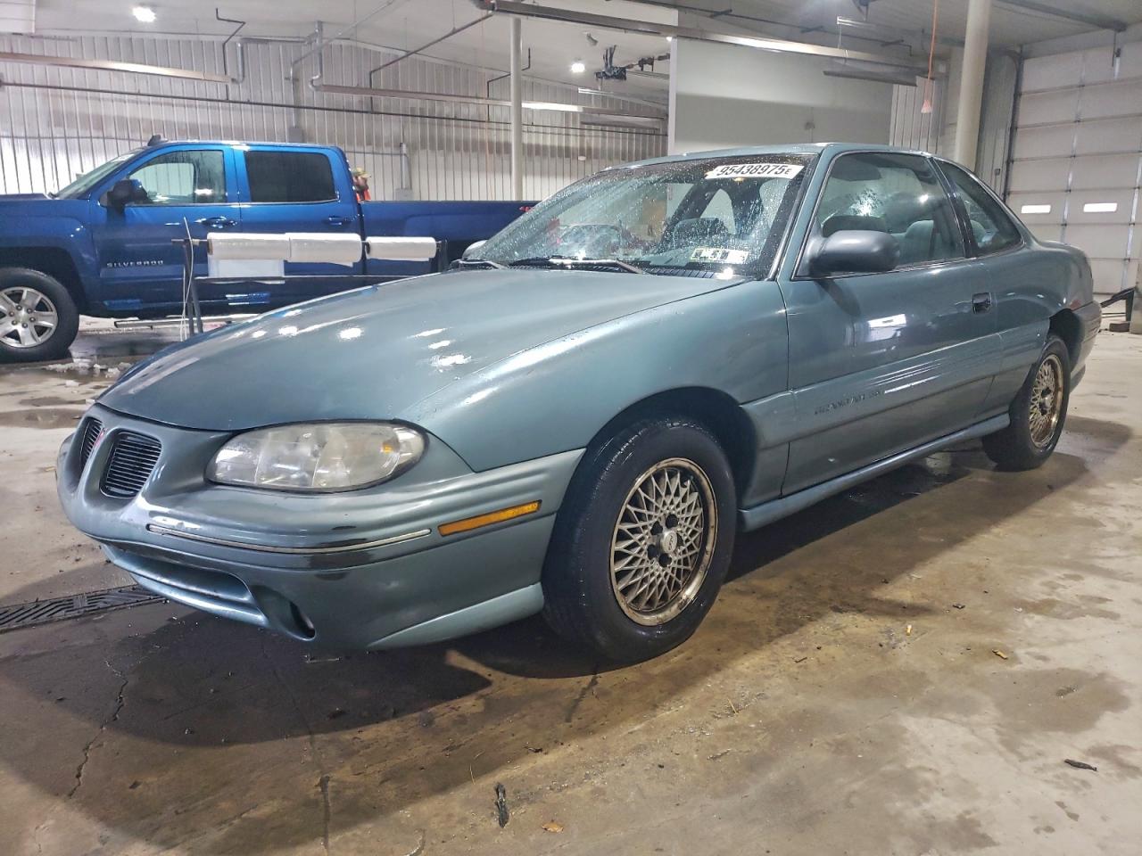 1996 Pontiac Grand Am, VIN 1G2NE12T9TM554692 — Side