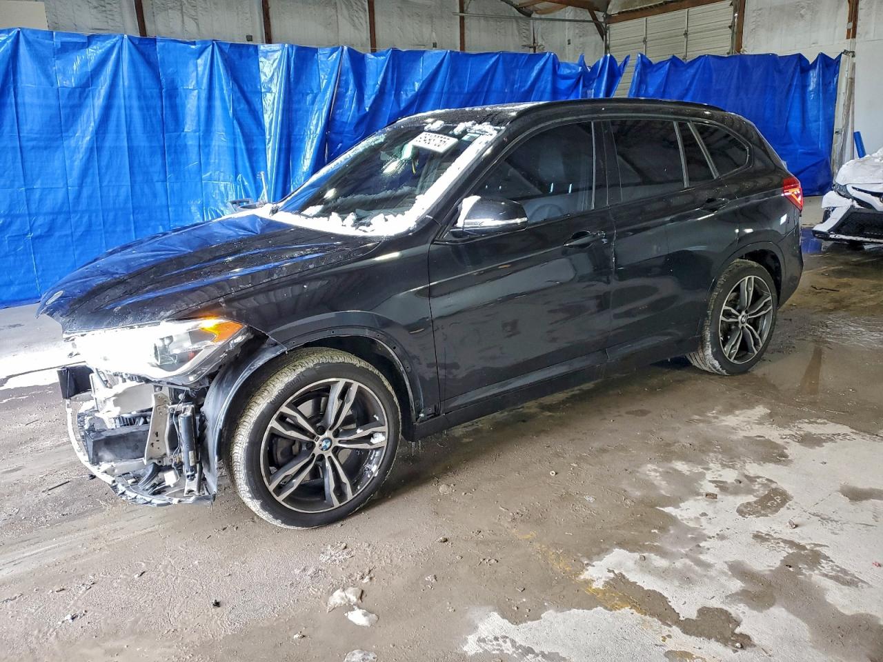 2018 BMW X1 xDrive28i, VIN WBXHT3C35J5L28958 — Front end