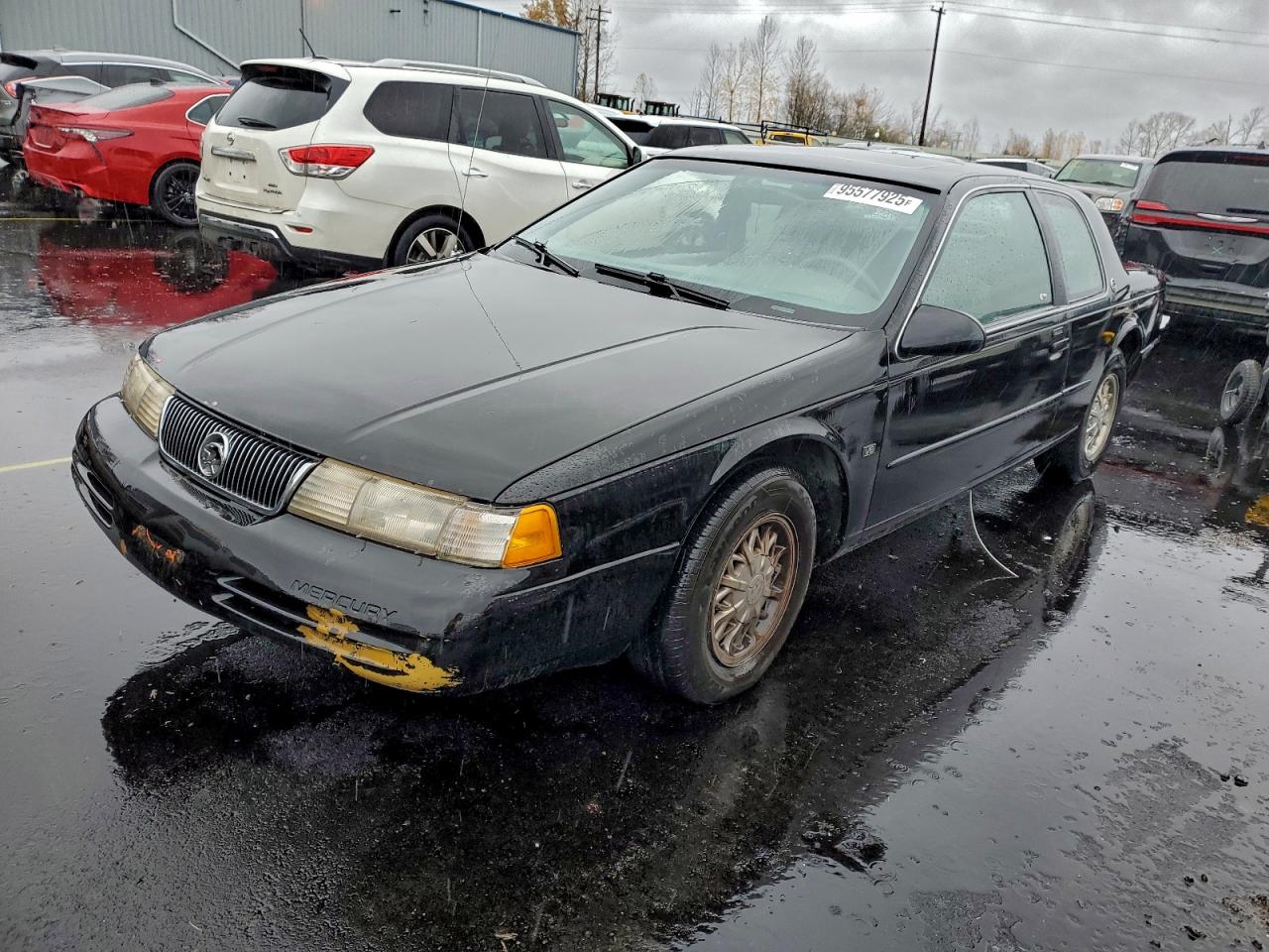 1995 Mercury Cougar XR7, VIN 1MELM62W9SH602145 — Side