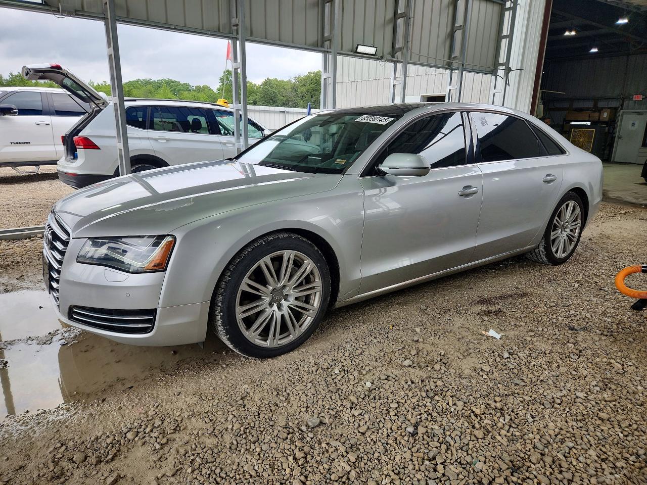 2011 Audi A8, VIN WAURVAFDXBN005699 — Normal wear