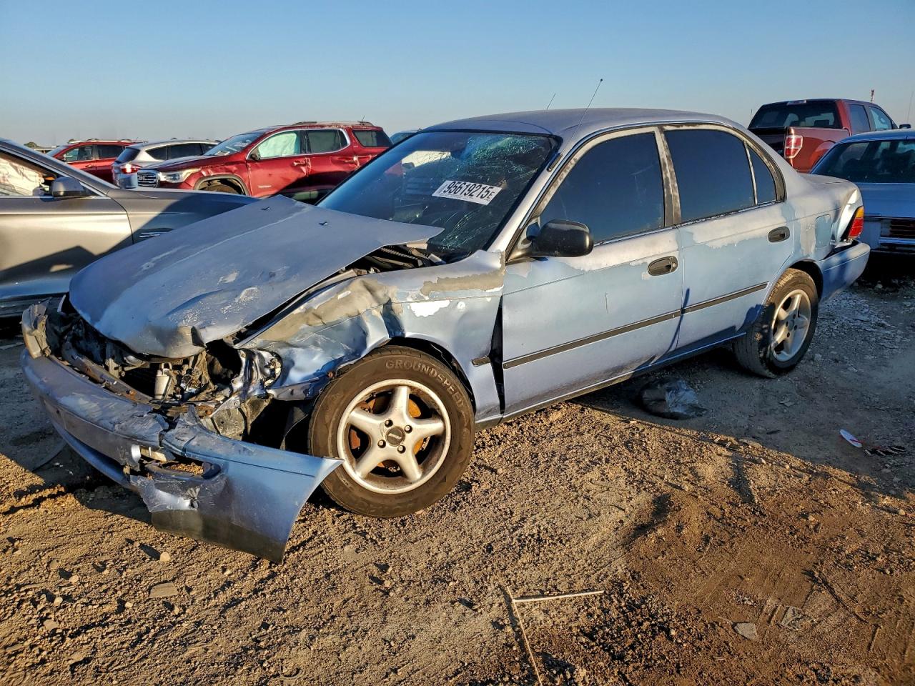 1995 Toyota Corolla DX, VIN 1NXAE09B4SZ238127 — Front end