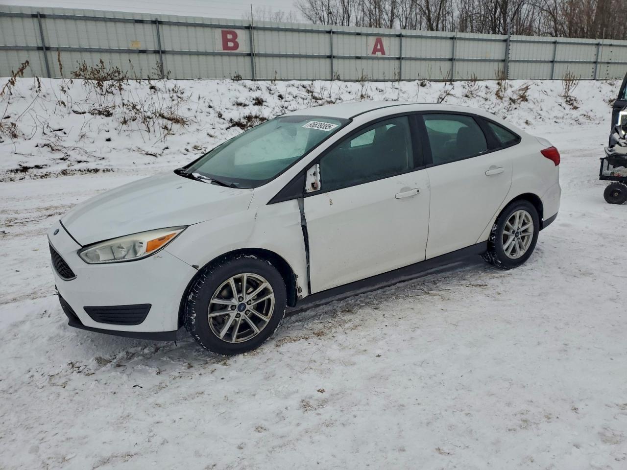 2015 Ford Focus SE, VIN 1FADP3F25FL289526 — Side