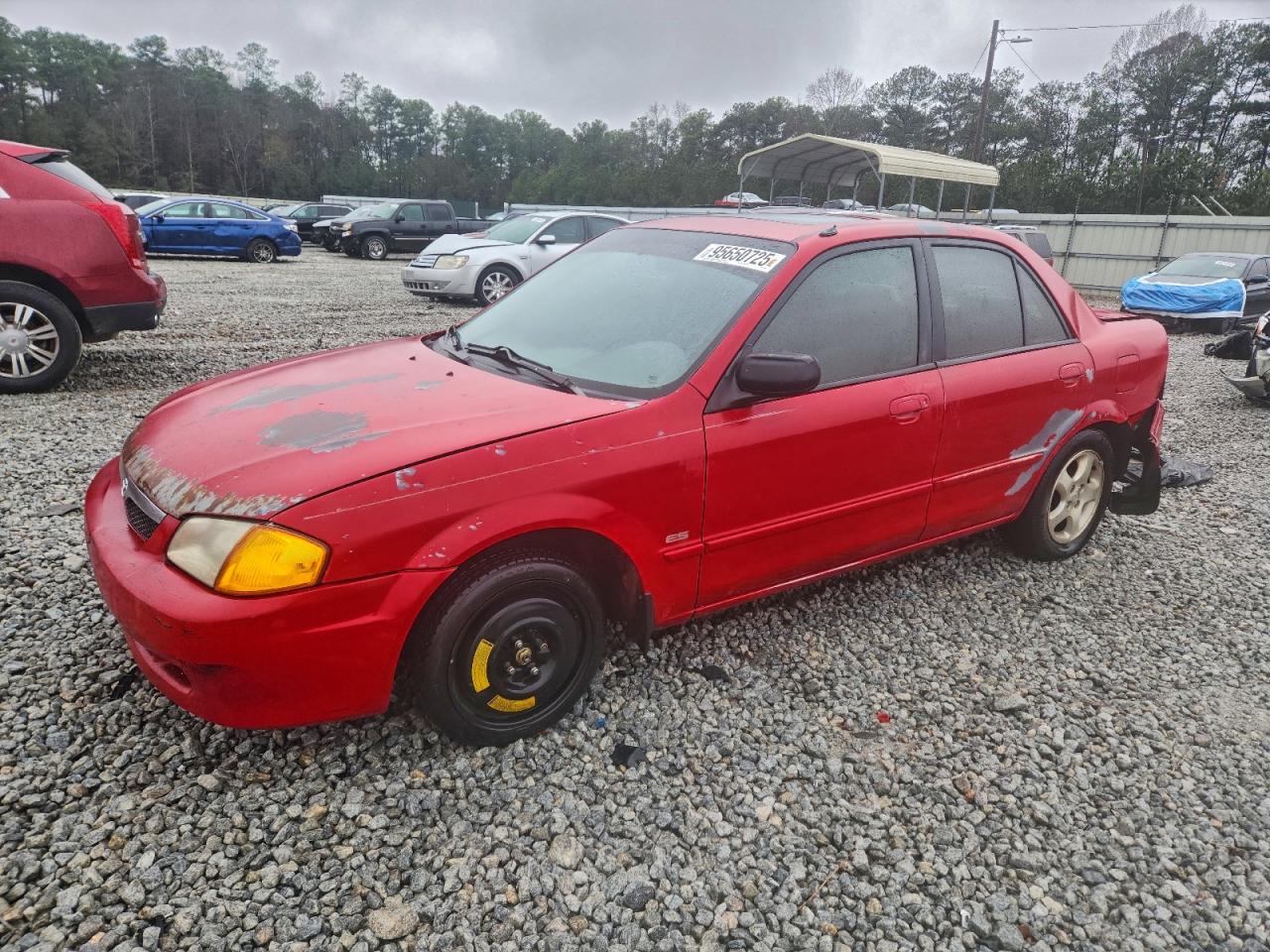 1999 Mazda Protege ES, VIN JM1BJ2213X0127049 — Зад