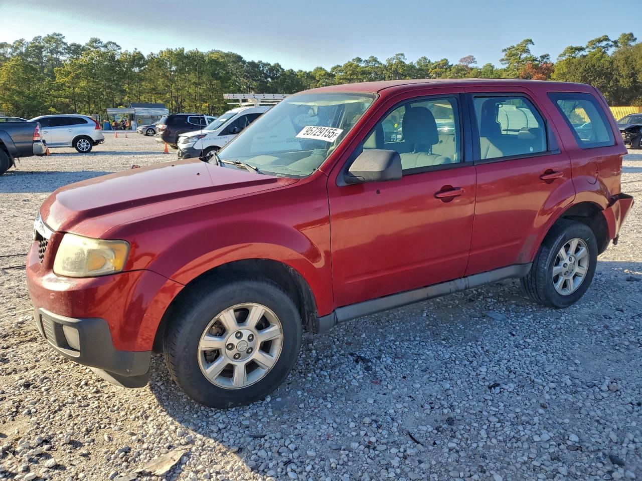 2010 Mazda Tribute Sport, VIN 4F2CY0C71AKM03621 — Зад