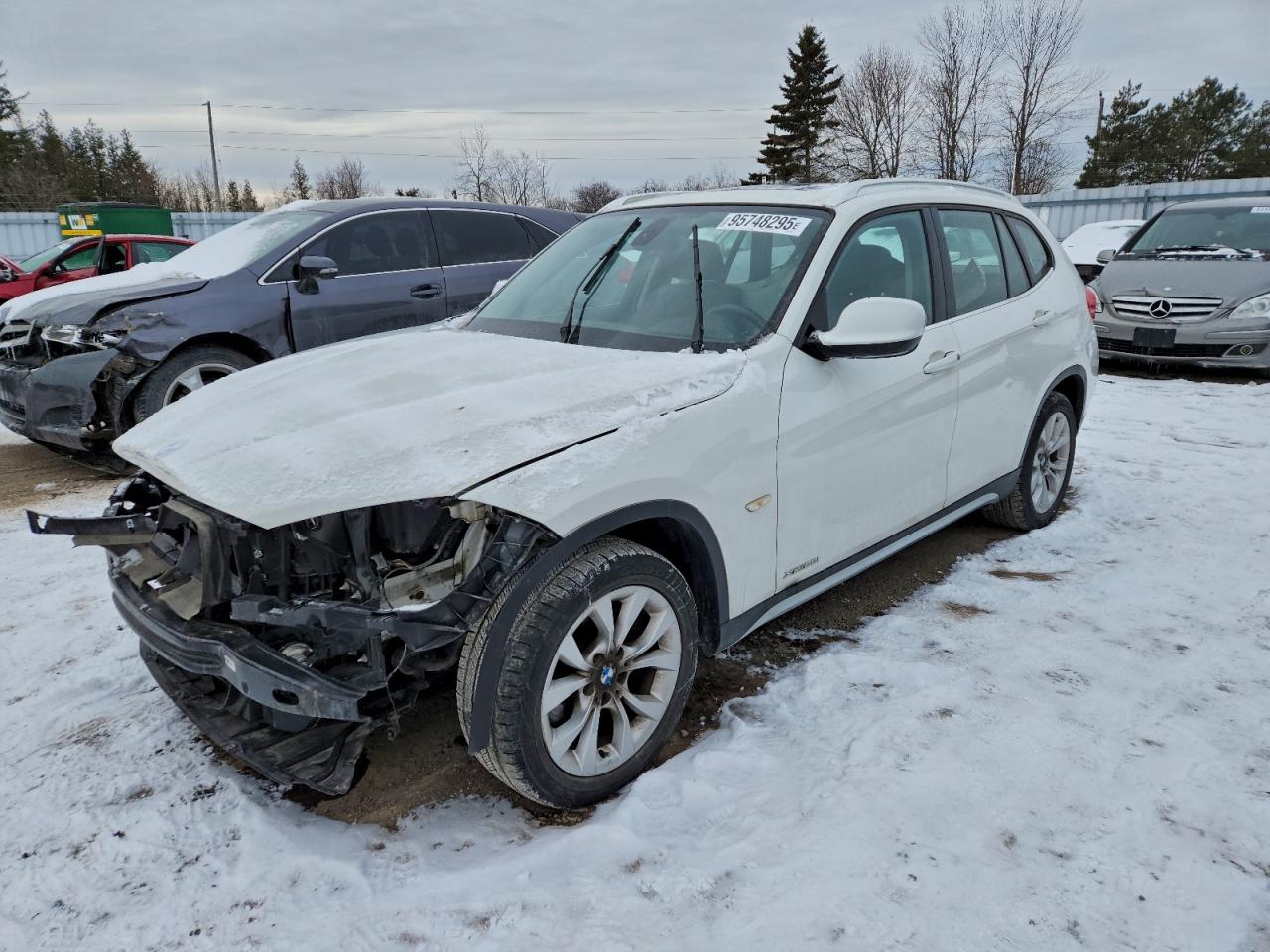 2012 BMW X1 28i, VIN WBAVL1C54CVR78872 — Front end