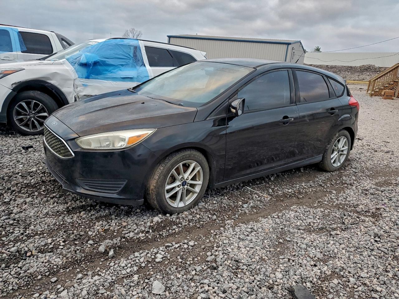 2015 Ford Focus SE, VIN 1FADP3K24FL219425 — Undercarriage