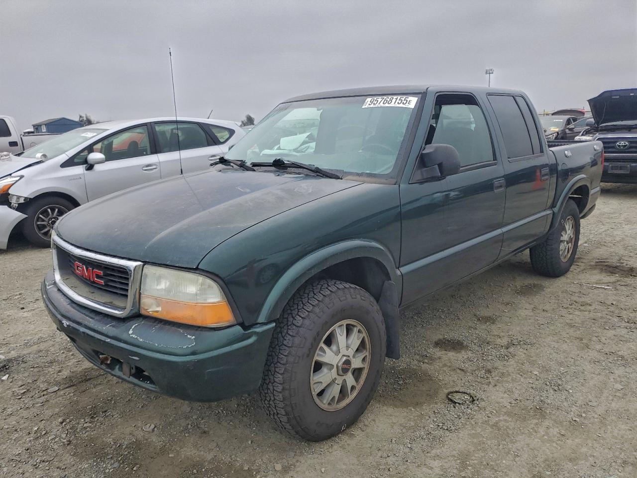 2004 GMC Sonoma SLS, VIN 1GTDT13XX4K100060 — Зад