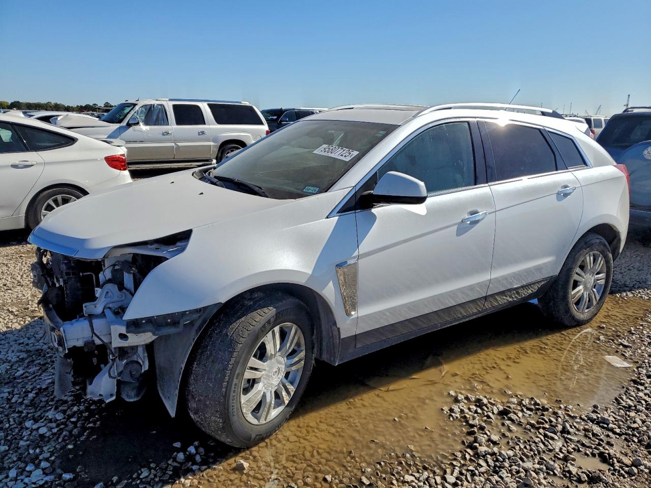 2016 Cadillac SRX Luxury Collection, VIN 3GYFNBE33GS532527 — Front end