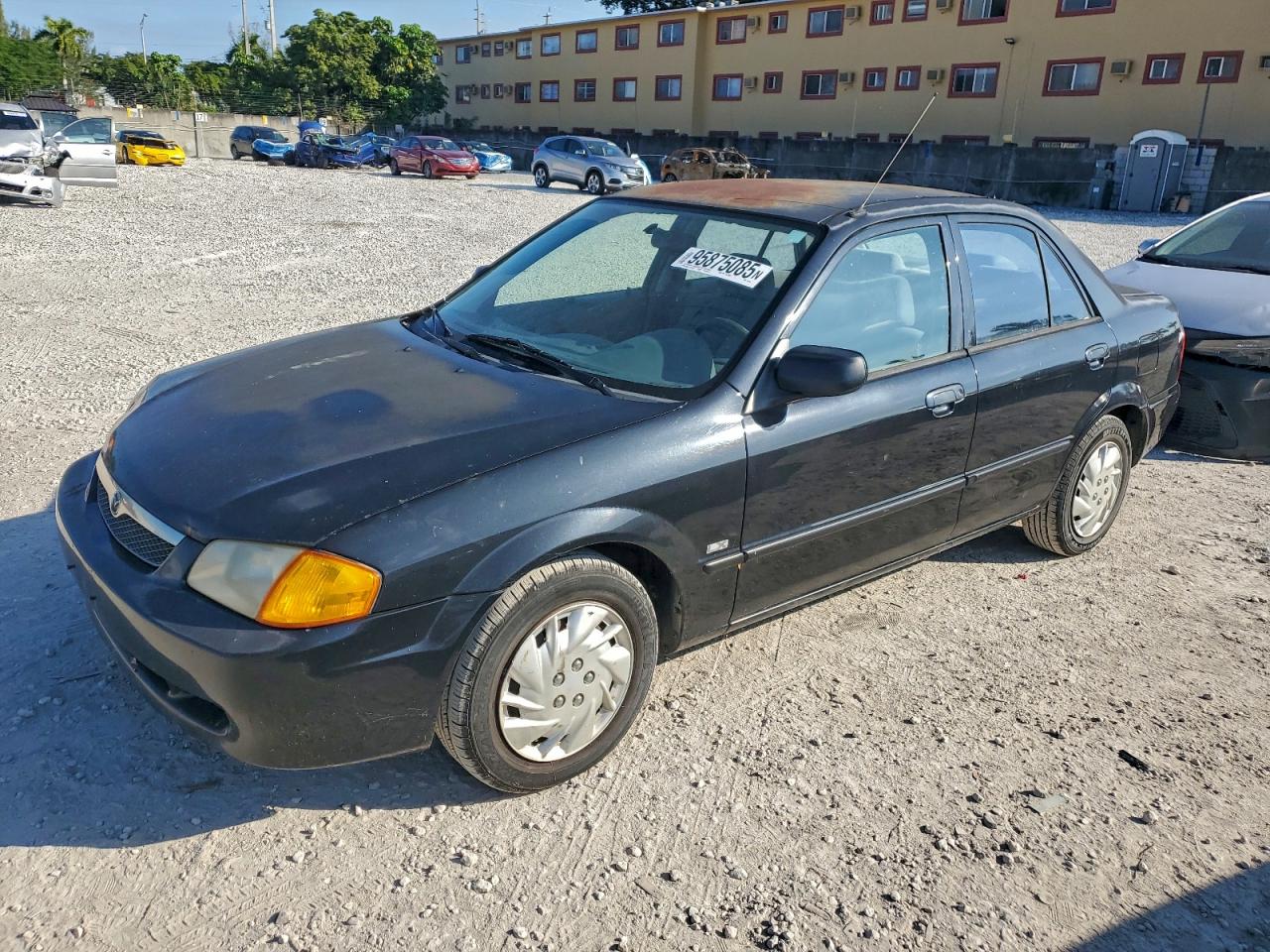 1999 Mazda Protege DX, VIN JM1BJ2223X0116156 — Мелкие вмятины и царапины