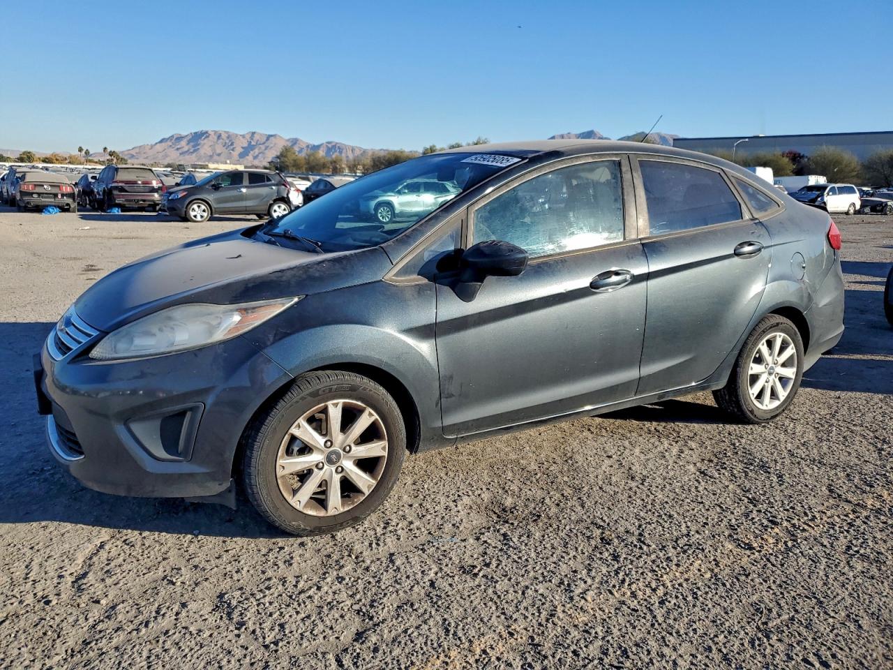 2011 Ford Fiesta SE, VIN 3FADP4BJ6BM196753 — Rear end