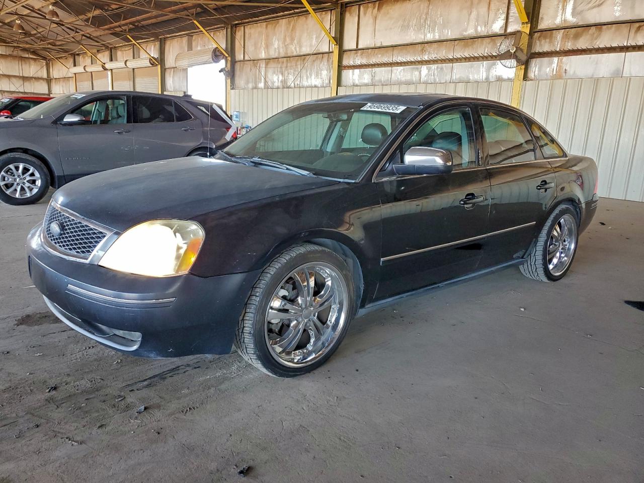 2006 Ford Five Hundred Limited, VIN 1FAFP25126G130449 — Rear end