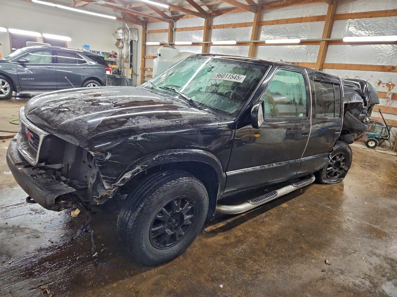 2004 GMC Sonoma SLS, VIN 1GTDT13X94K100857 — Зад