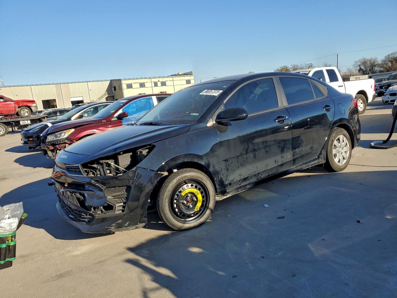 2023 Kia Rio S, VIN 3KPA24AD1PE557539 — Front end