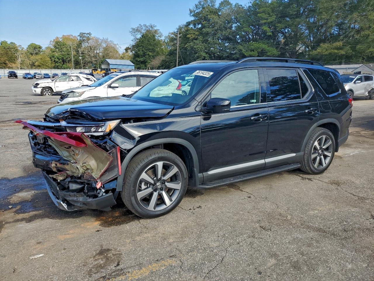 2025 Honda Pilot Touring, VIN 5FNYG2H78SB030668 — Front end