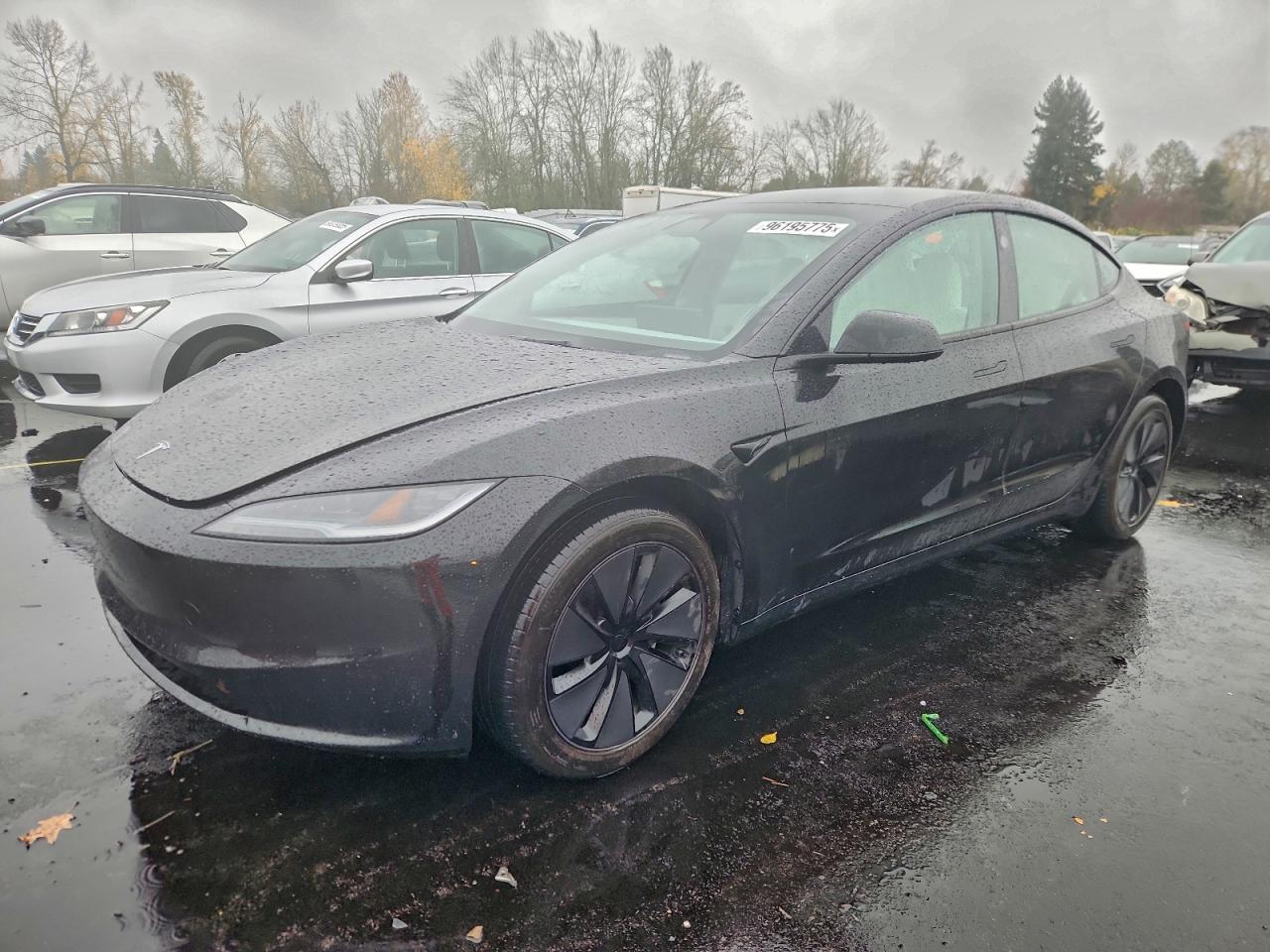 2025 Tesla Model 3 Long Range, VIN 5YJ3E1EA1SF030828 — Front end