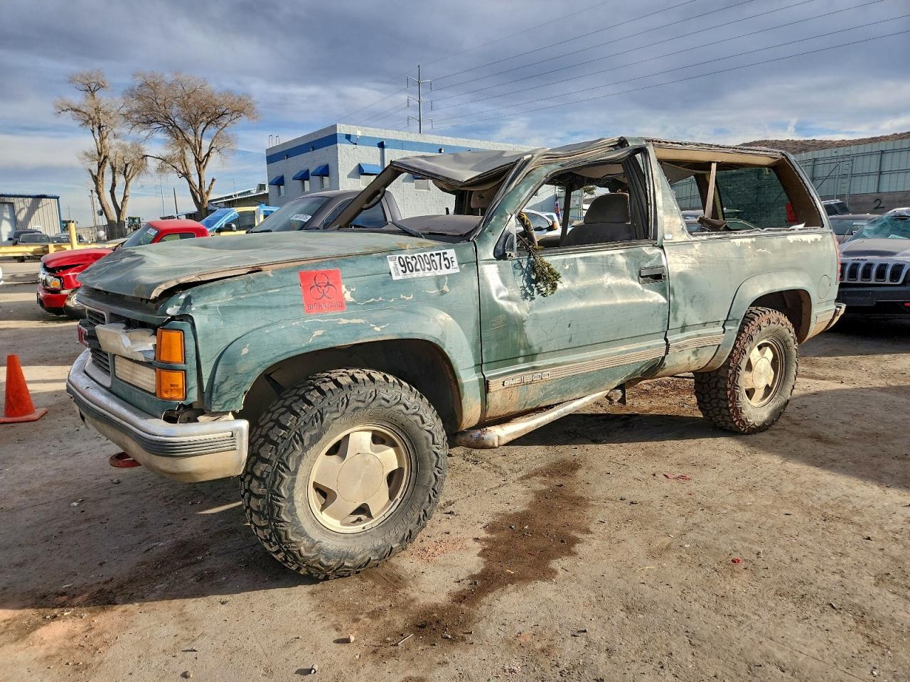 1995 GMC Yukon, VIN 3GKEK18KXSG502450 — Rollover