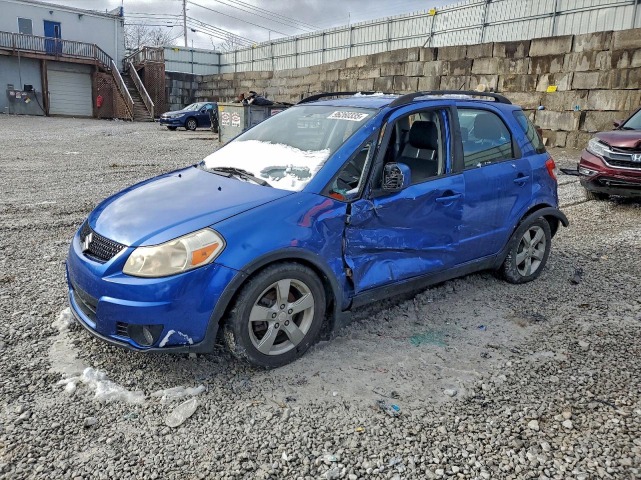 2012 Suzuki SX4 Crossover, VIN JS2YB5A32C6305087 — Side