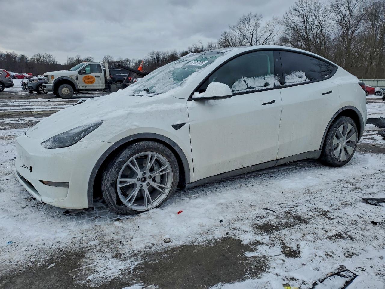 2023 Tesla Model Y Long Range, VIN 7SAYGAEE2PF859792 — Фото с аукциона 1 of 4