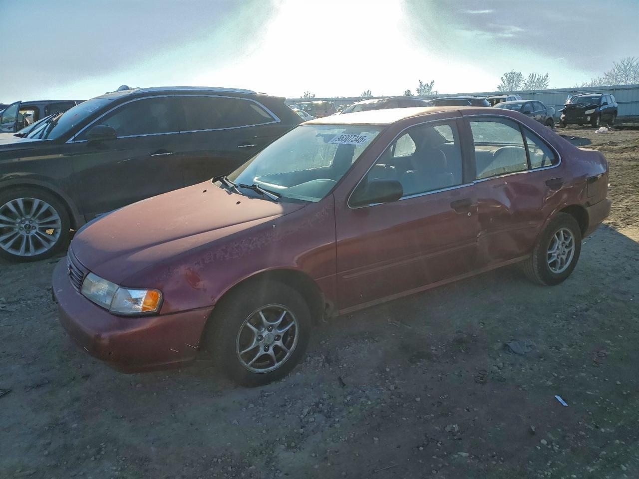 1997 Nissan Sentra XE, VIN 1N4AB41D5VC727587 — Бок