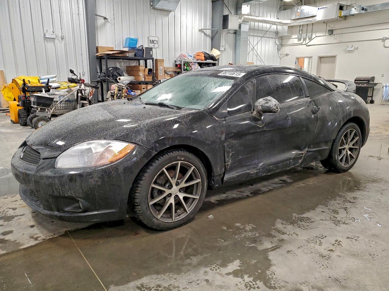 2011 Mitsubishi Eclipse GT, VIN 4A31K3DT2BE601370 — Side
