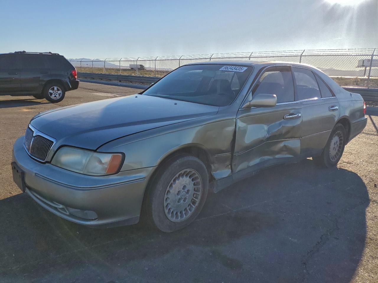 1997 Infiniti Q45, VIN JNKBY31D1VM005873 — Side