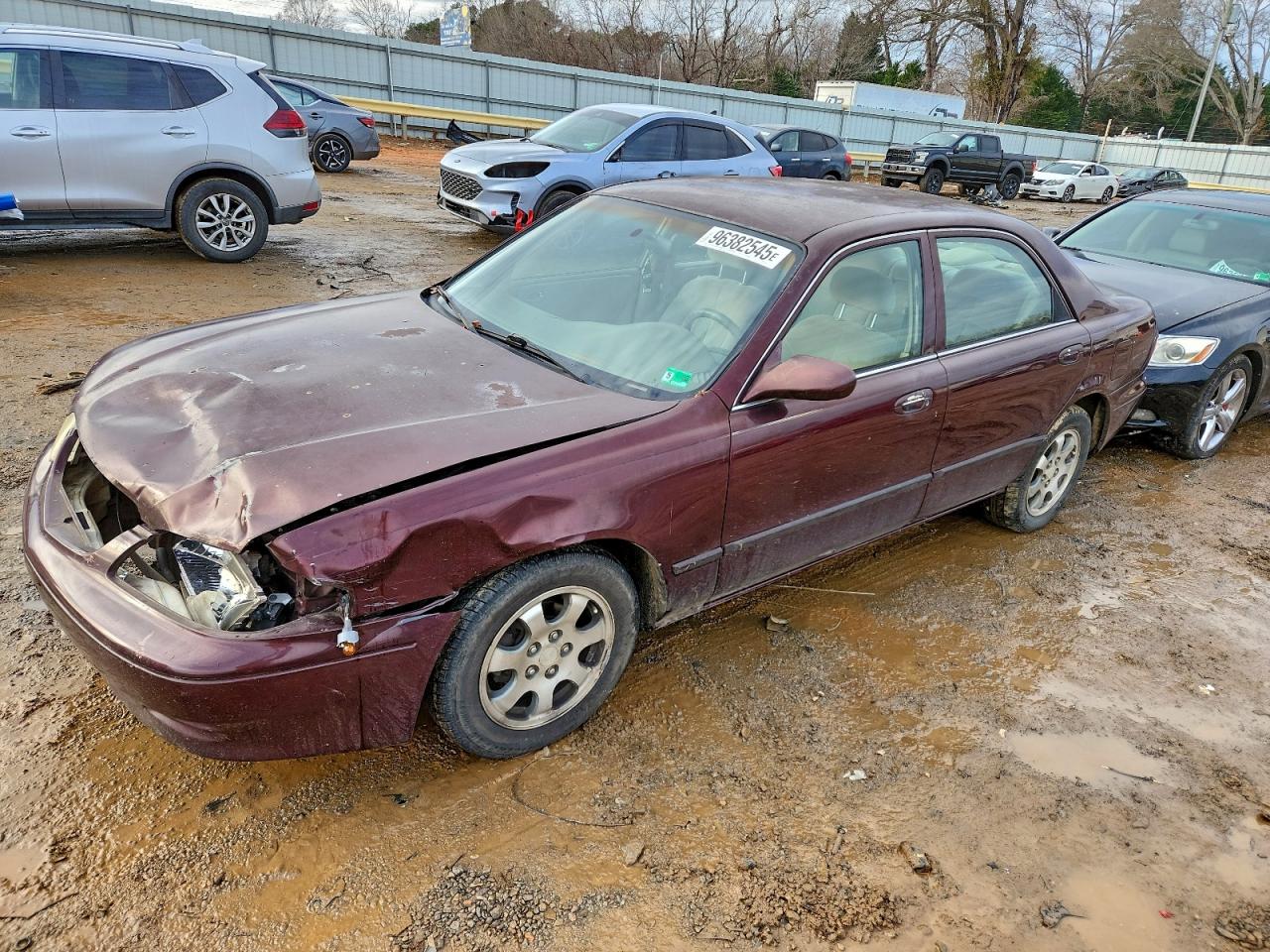 2002 Mazda 626 LX, VIN 1YVGF22C025305157 — Front end