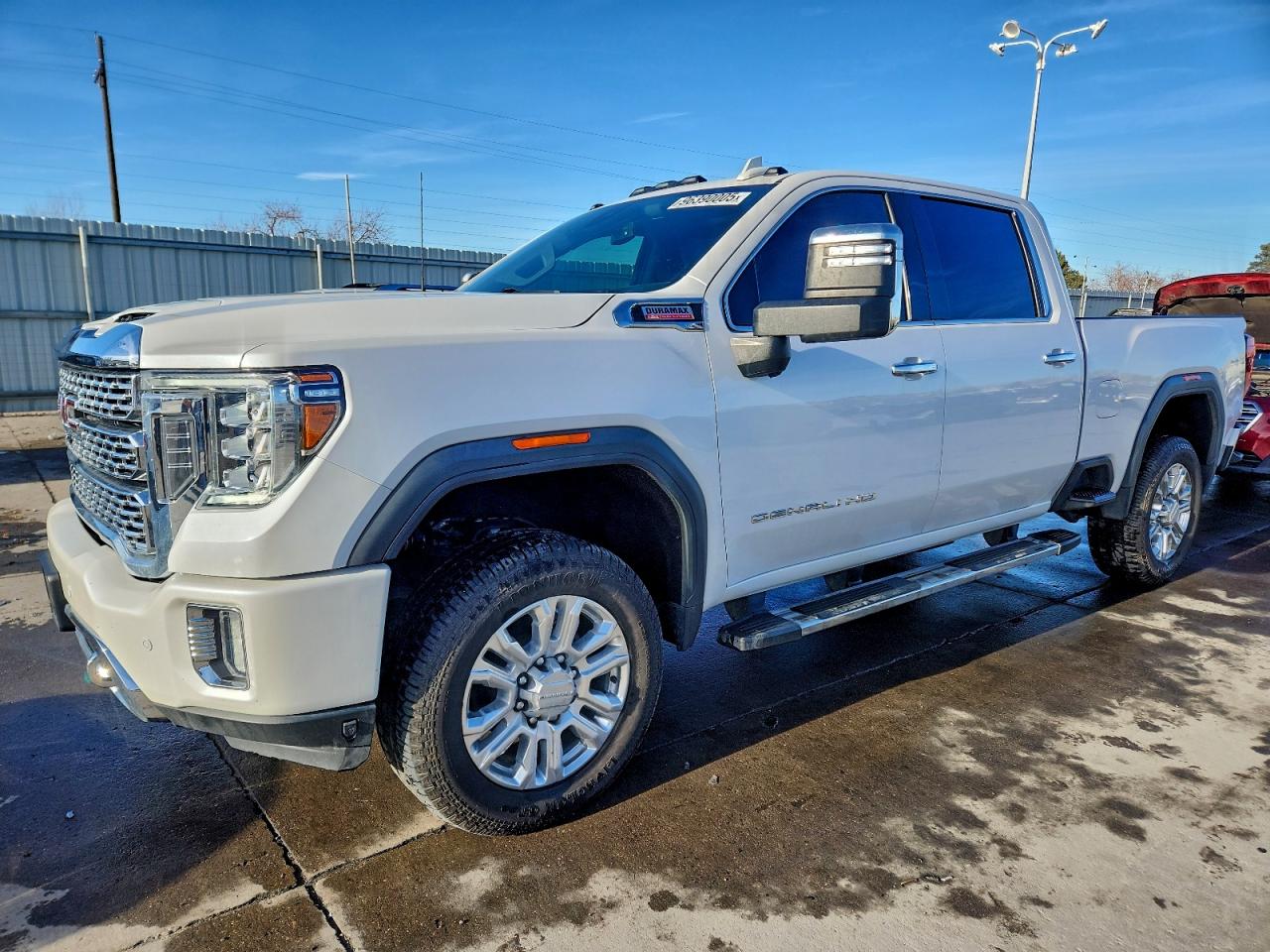 2022 GMC Sierra 2500HD Denali, VIN 1GT49REY2NF104634 — Vandalism