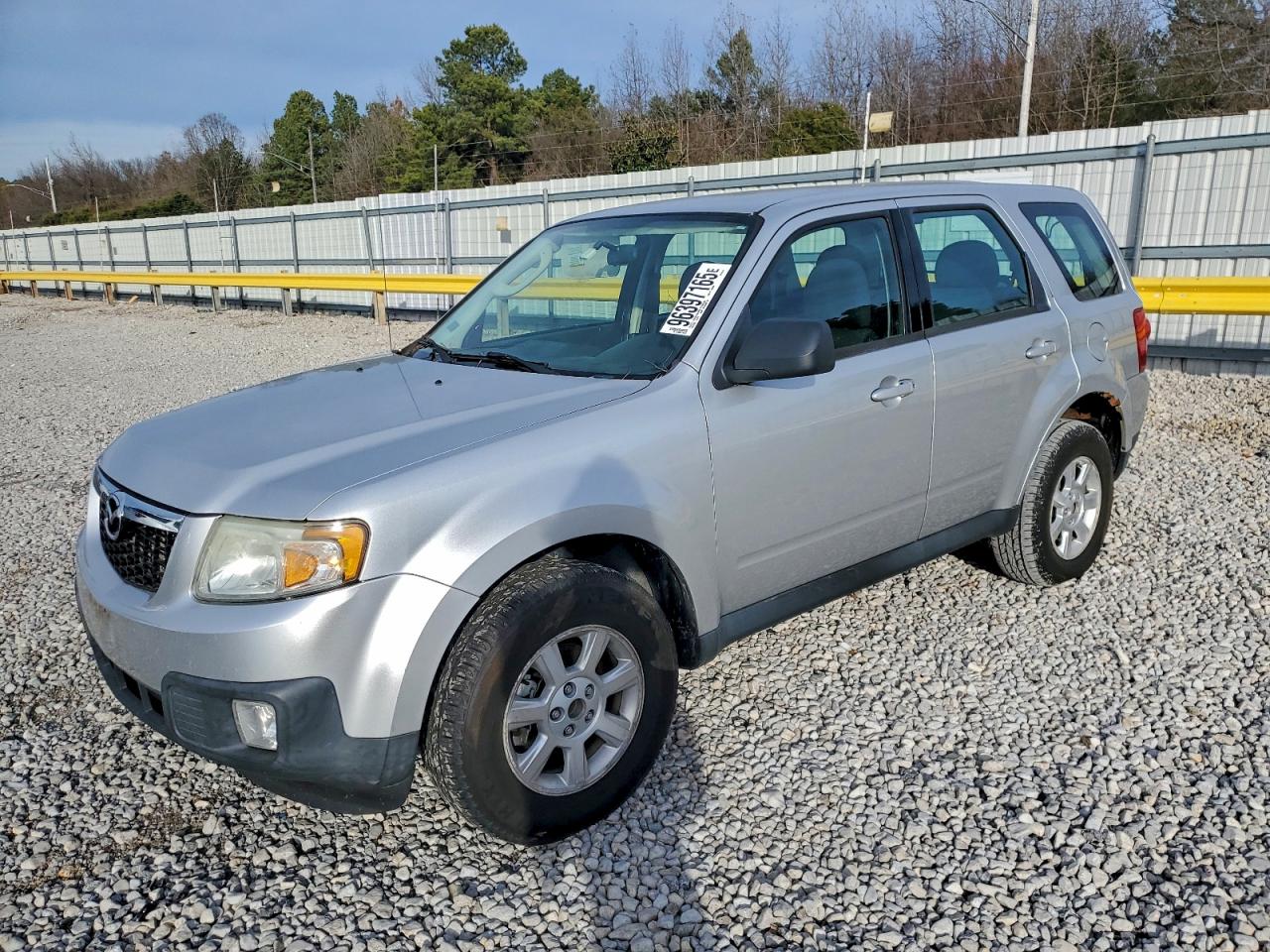 2010 Mazda Tribute Sport, VIN 4F2CY0C76AKM04134 — Зад