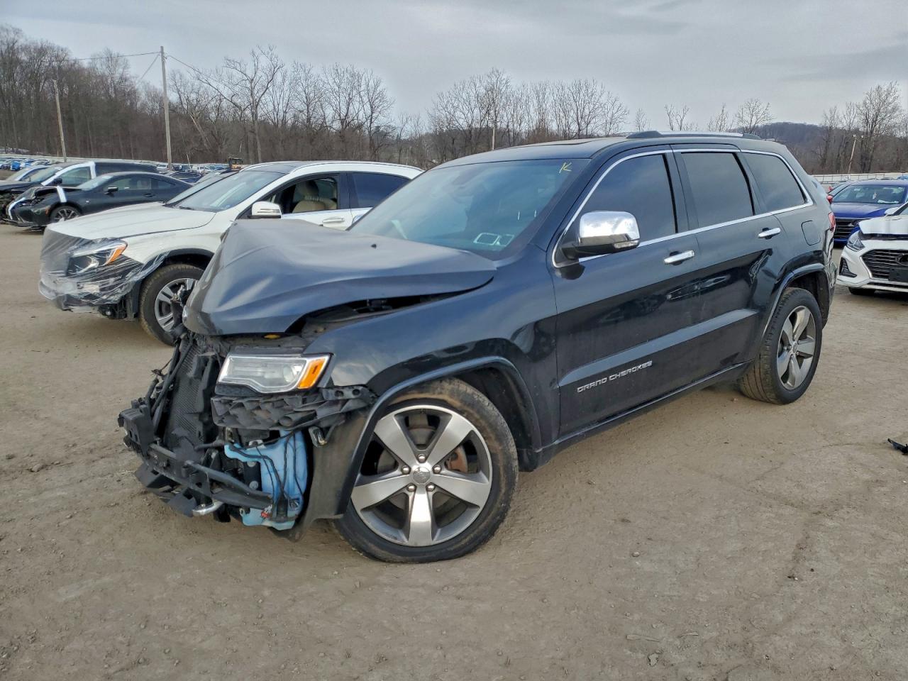 2016 Jeep Grand Cherokee Overland, VIN 1C4RJFCG5GC389467 — Front end